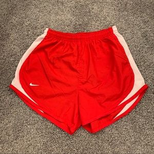 Red Nike shorts